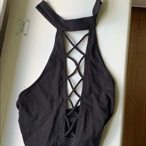 black cross front body suit from express